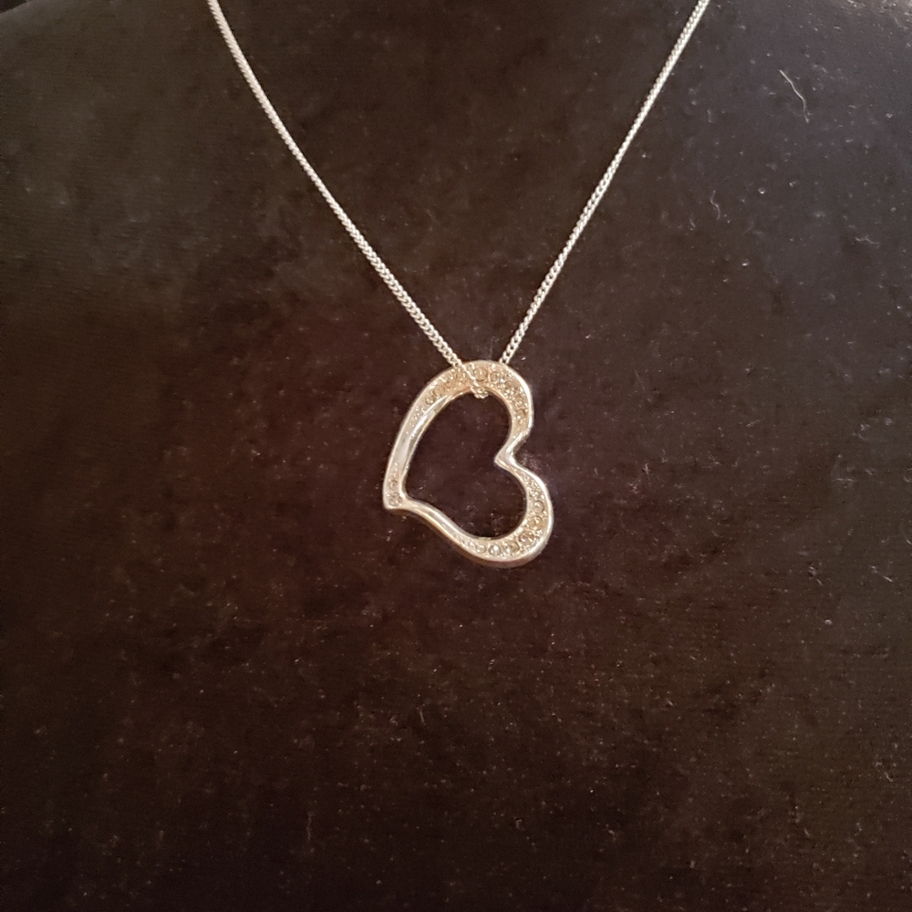 Avon silver plate heart and rhinestone necklace.